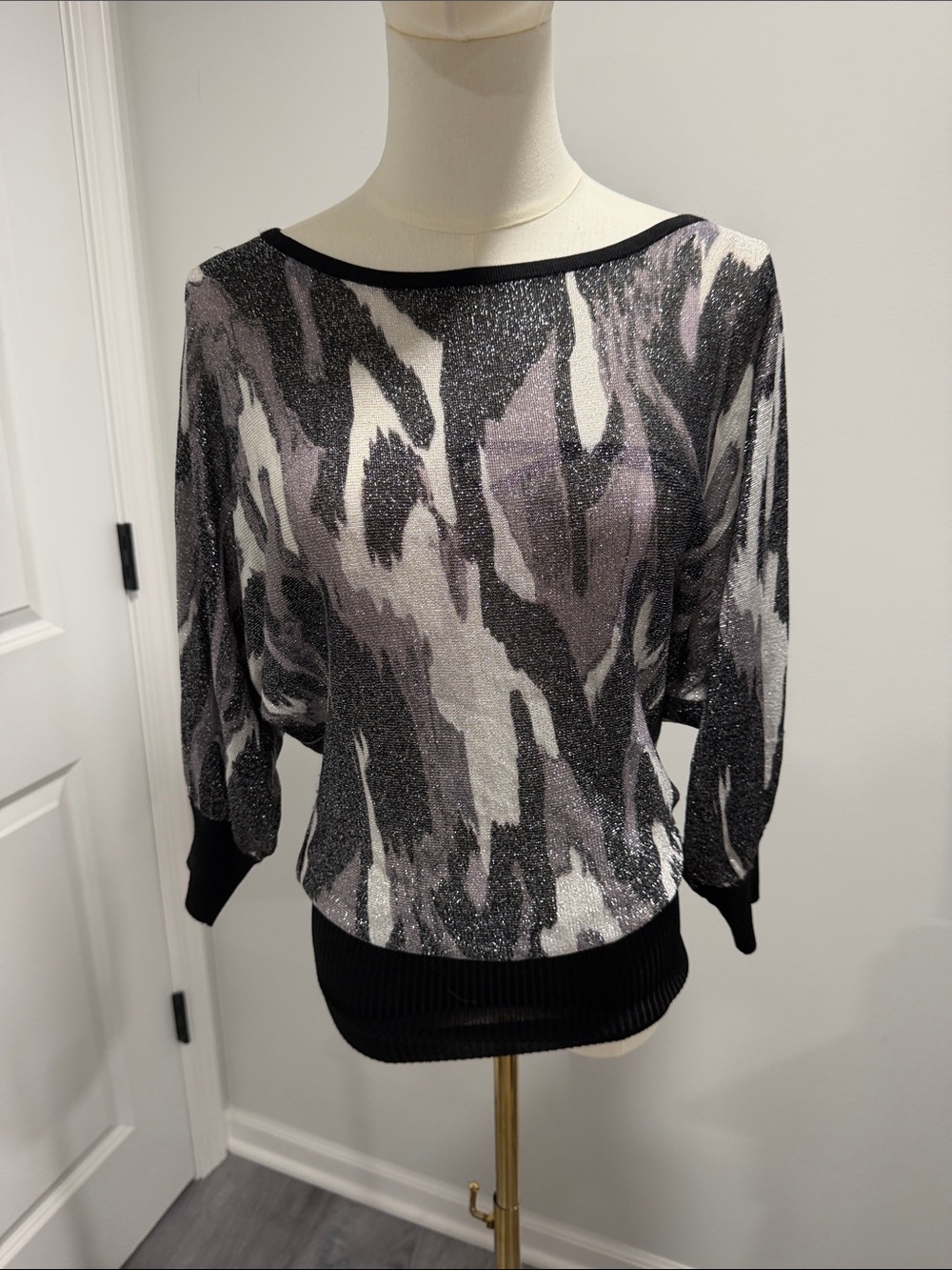 NWOT Express Metallic semi sheer Silver Knit Top with Black Trim